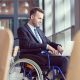 Disabled businessman working in an office