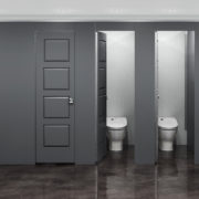 Charcoal Grey Aria Partitions in Industrial Restroom