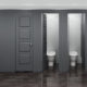 Charcoal Grey Aria Partitions in Industrial Restroom