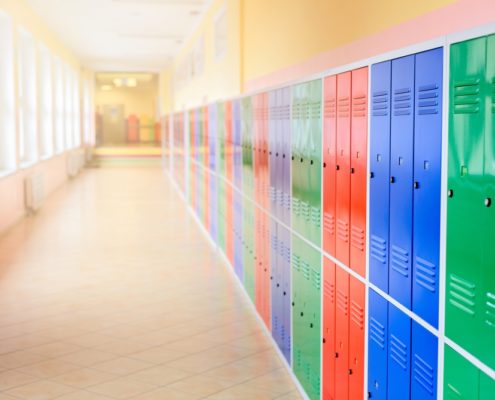 Metal Lockers in a School Hallway