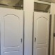 Row of Hiny Hider shower doors that are closed